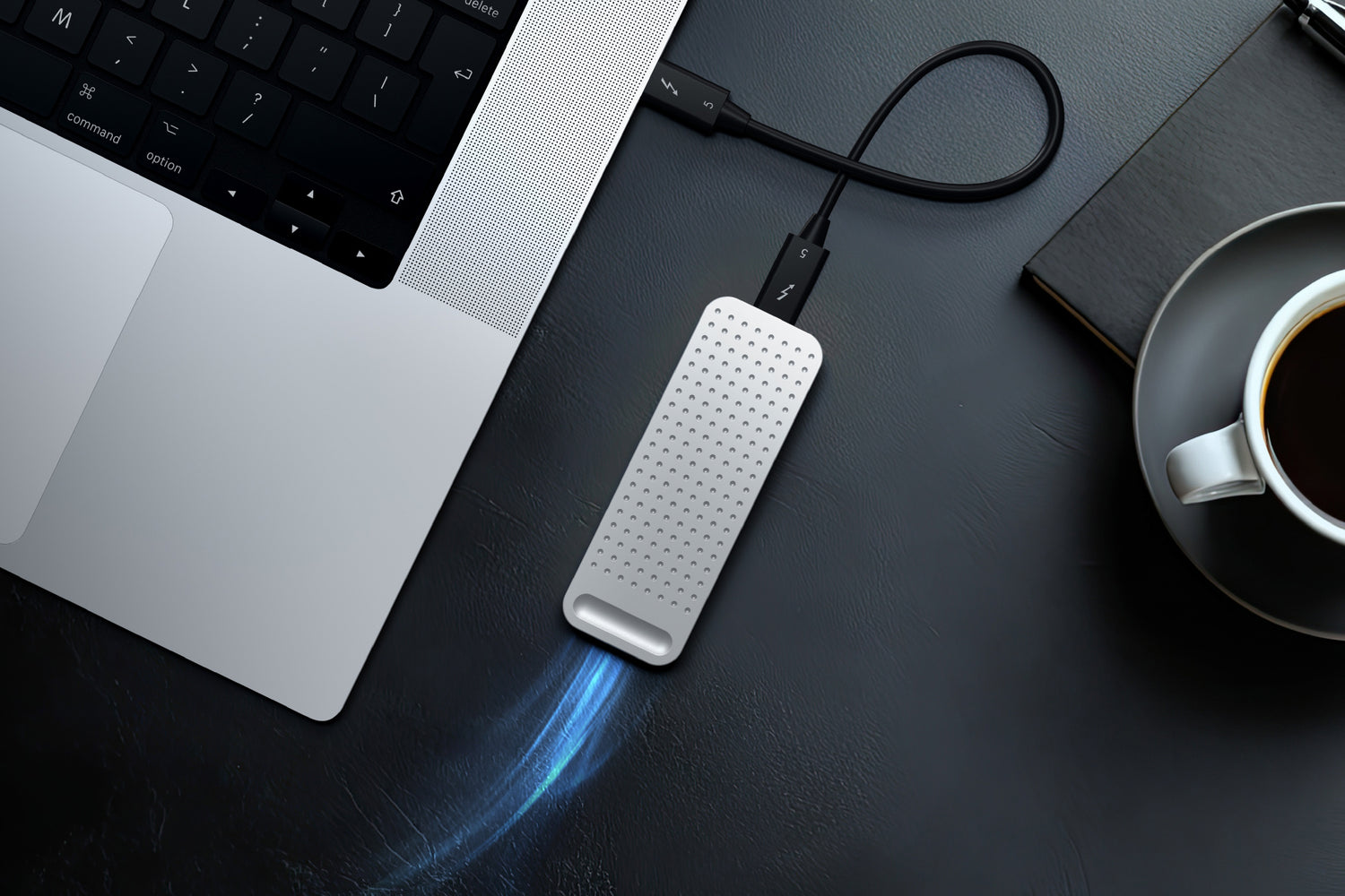 Satechi’s DIY Thunderbolt 5 SSD drive keeps cool with a tiny fan during long transfers.